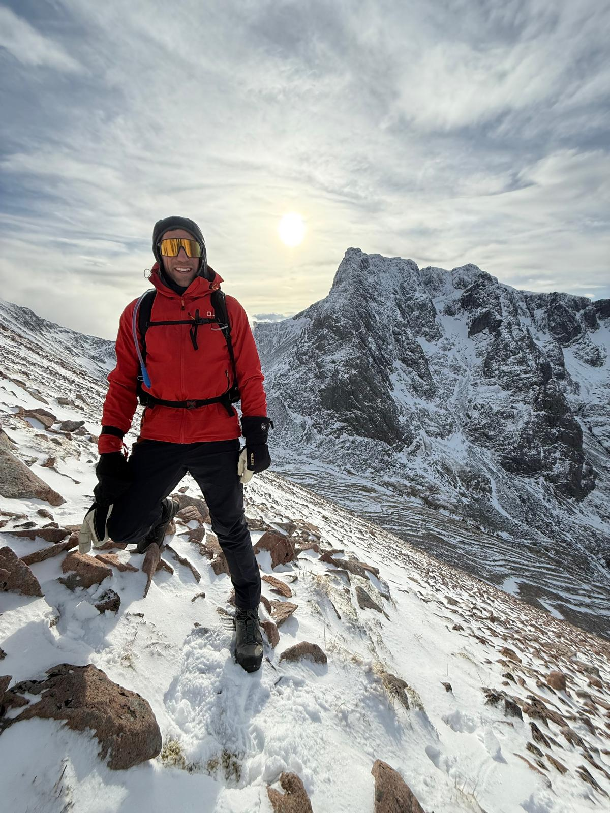 Glacier Clean Energy founder on a snowy mountain ridge